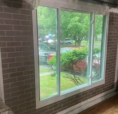 window and door installation on a house