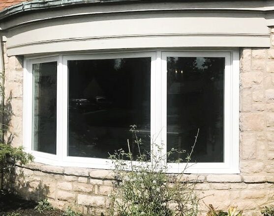 window and door installation on a house